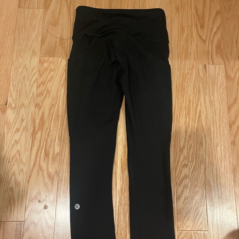 Lululemon black size 2 leggings; many pockets